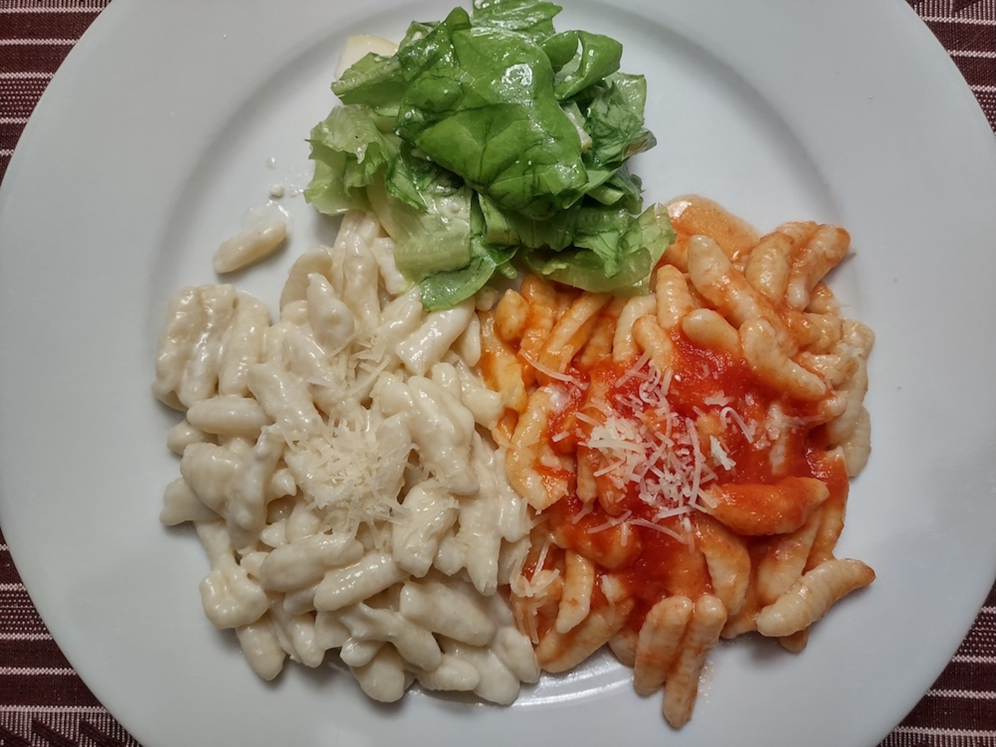 An image of gnocchi laying on a sheet.